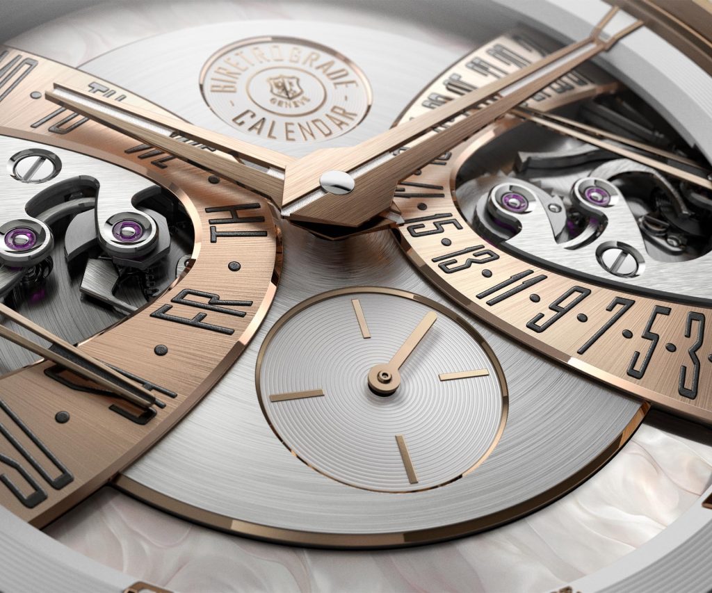 Close-up detail of the ellipse-shaped retrograde day display at 9 o'clock, showing the distinctive curved scale that widens toward the outer edge of the dial.