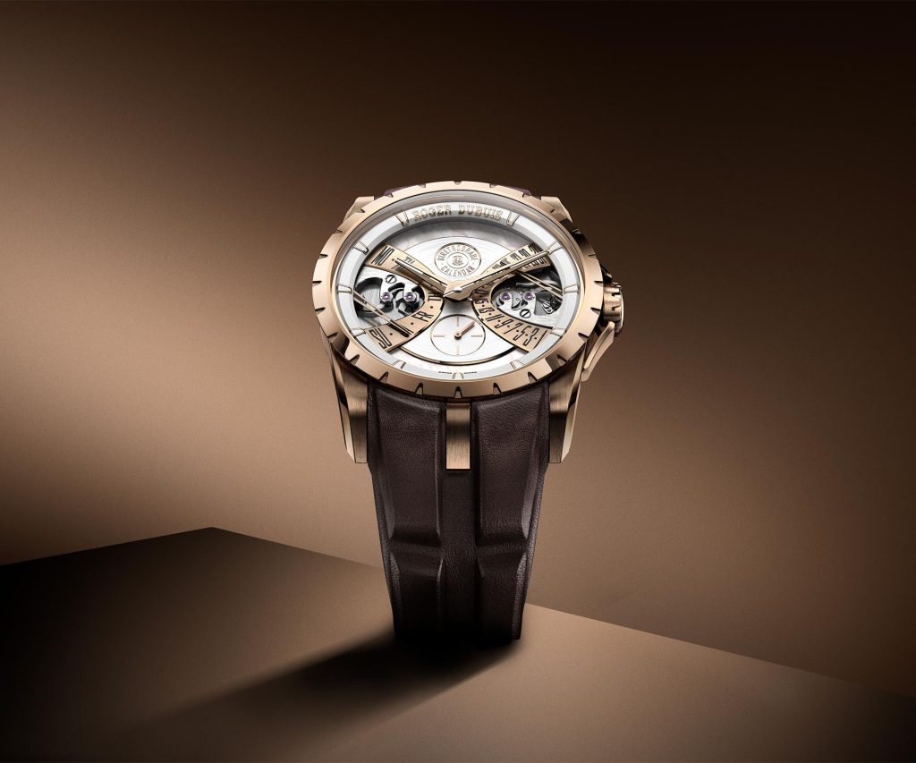 1.Roger Dubuis Excalibur Biretrograde Calendar Ref. RDDBEX1179 in 40mm pink gold case featuring a silver-plated dial with retrograde day and date displays at 3 and 9 o'clock, and mother-of-pearl inserts.