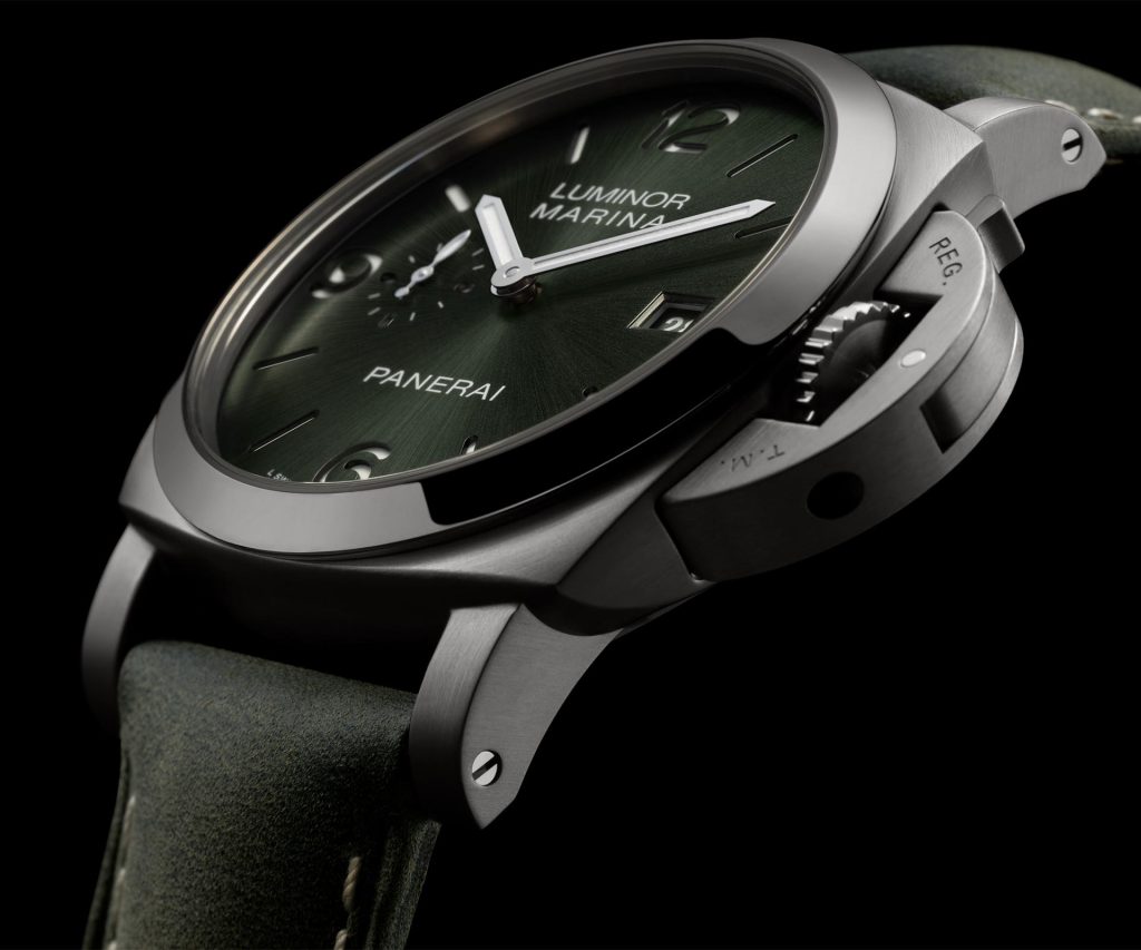 Panerai Luminor Marina Titanio PAM03325 with 44mm brushed titanium case, olive green sun-brushed dial, white Super-LumiNova® X2 markers, and signature crown protection device.